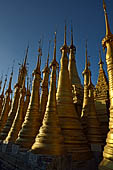 Inle Lake Myanmar. Indein, on the summit of a hill the  Shwe Inn Thein Paya a cluster of hundreds of ancient stupas. Many of them are ruined and overgrown with bushes. 